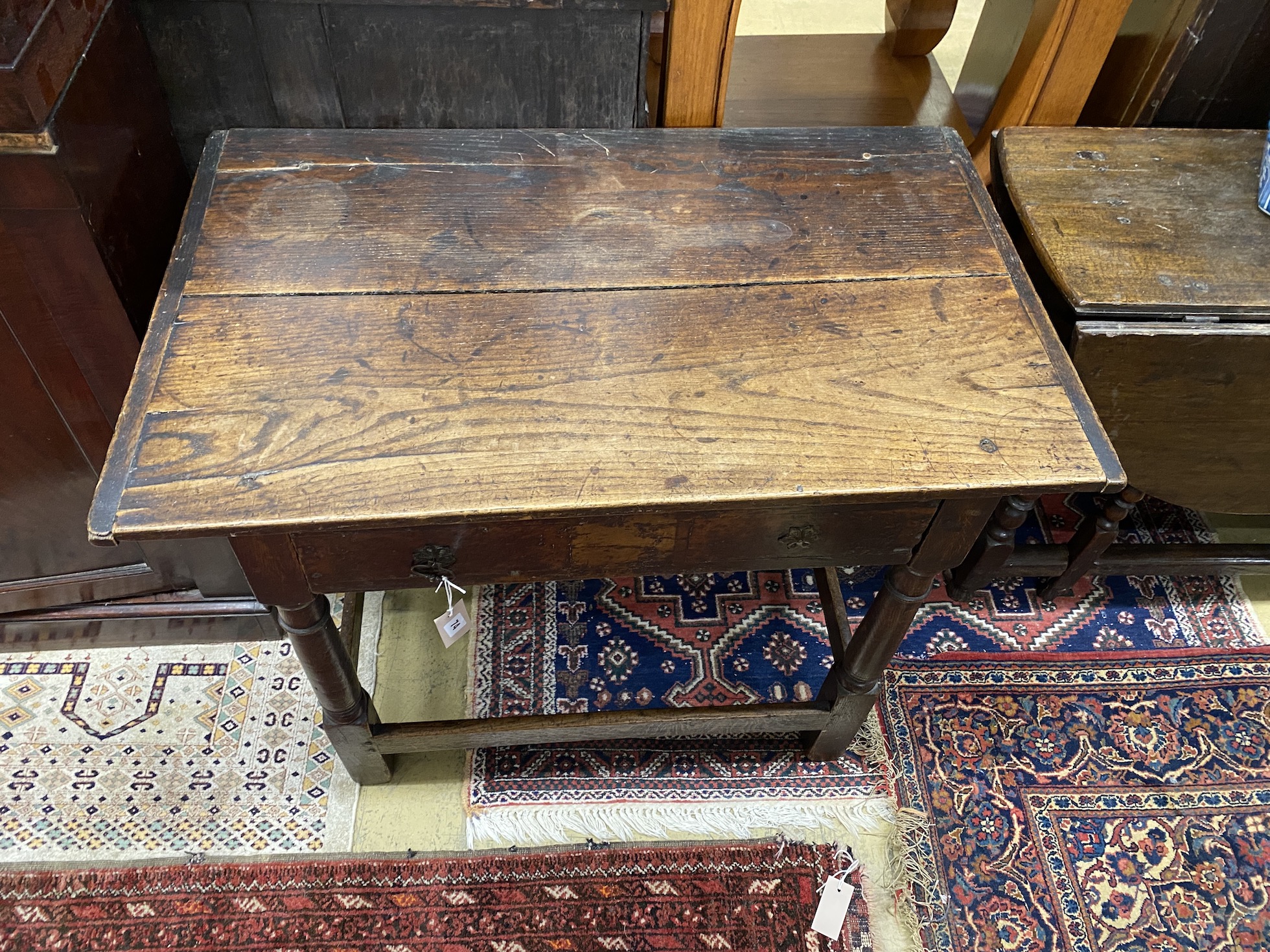 An 18th century oak two drawer side table, width 91cm, depth 56cm, height 70cm